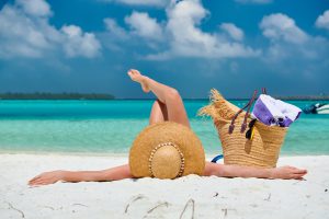 woman lying down on beach 2021 08 26 16 19 28 utc scaled